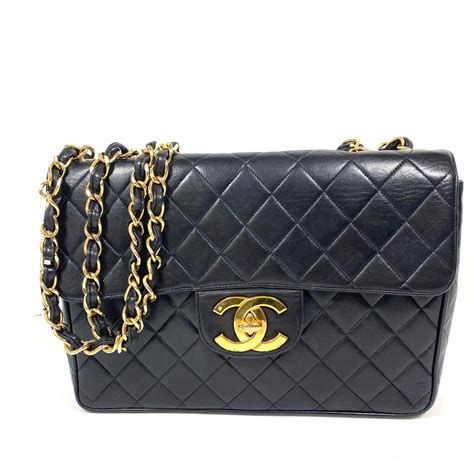 chanel gold black bag|black chanel jumbo flap bag.